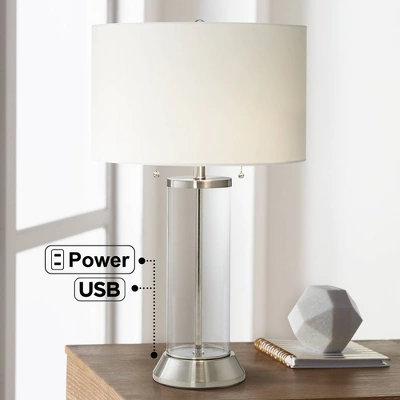 Possini Euro Design Fritz Modern Table Lamp 26 1/2" High Silver Clear Glass Column With USB And AC Power Outlet In Base Drum Shade For Bedroom Desk 1 Possini Euro Design Fritz Modern Table Lamp 26 1/2" High Silver Clear Glass Column With USB And AC Power Outlet In Base Drum Shade For Bedroom Desk